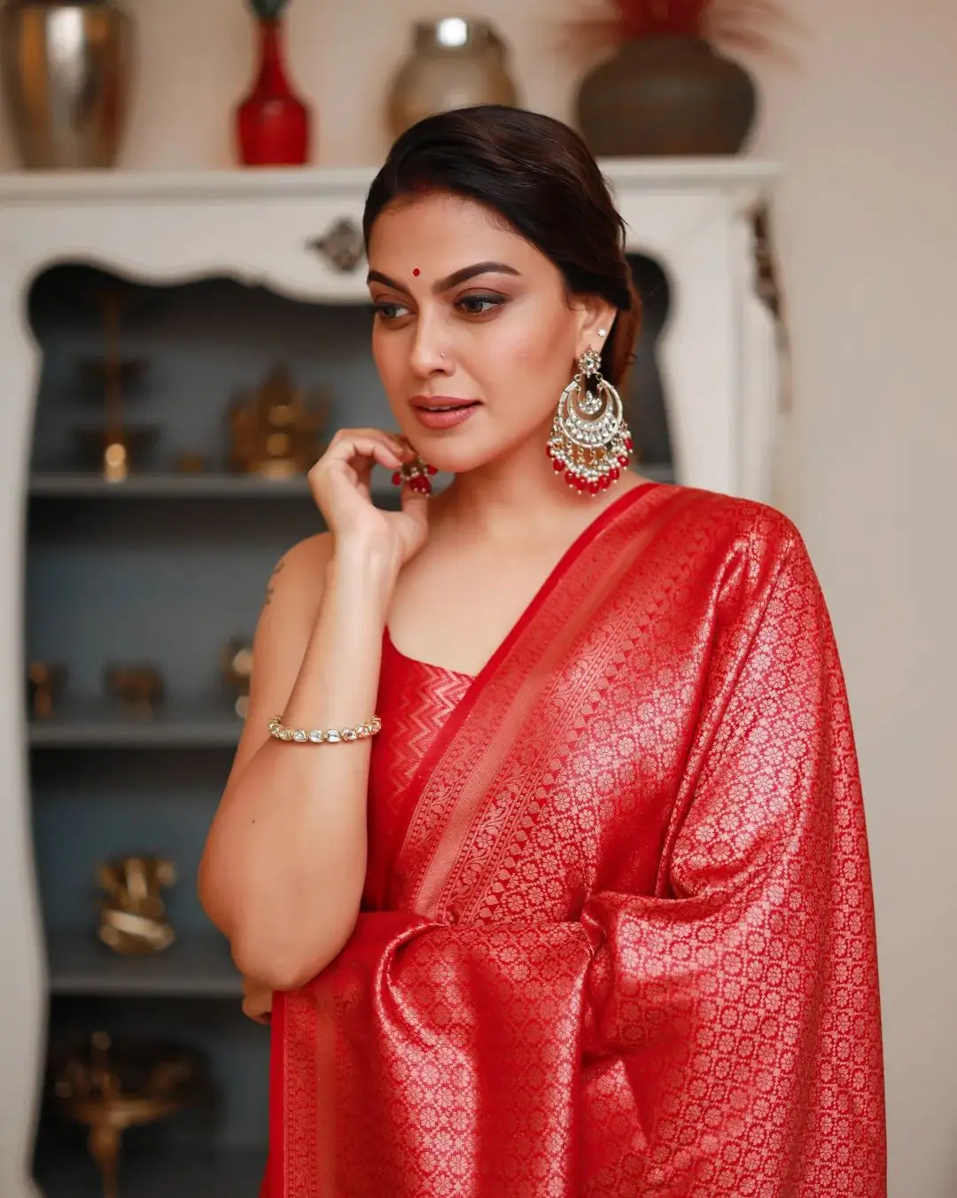 Indian Actress Anusree Nair in Red Color Saree Sleeveless Blouse